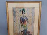 tableau encadré représentant une femme en costume, avec un perroquet sur la tête