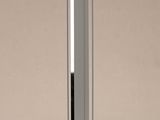 a glass table with a metal pole on it