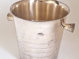 a silver bucket with a handle on a white background