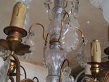 a chandelier that has a lot of glass hanging from it