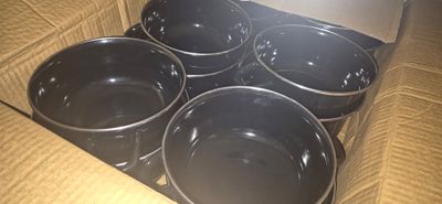 a box that has six bowls inside of it