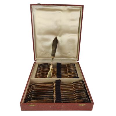 a red case with a set of silverware in it