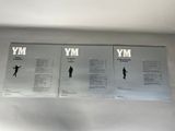 three silver metal plaques with the names of people on them