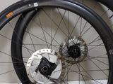 two wheels that are next to each other on a table