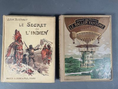 Deux livres sont posés sur une surface bleue, avec une montgolfière en arrière-plan