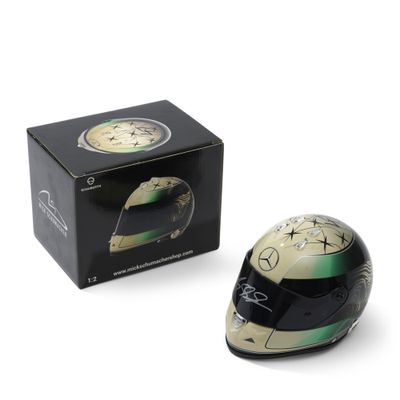 a helmet that is sitting next to a box