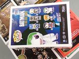 a box of batman pop vinyl figures sitting on a table