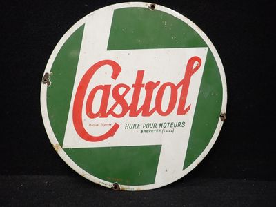un panneau vert et blanc sur lequel est inscrit « Castrool »
