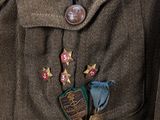 a close up of a jacket with a badge on it