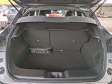 a trunk of a car with the back door open