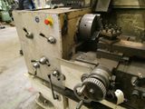 a machine that is working on a piece of metal