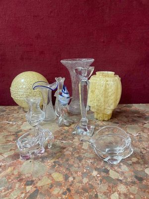 a lot of glass items sitting on a table