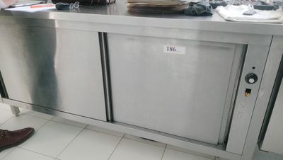 a stainless steel counter top with a dishwasher and a dishwasher