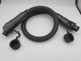 an image of a black hose and a black hose on a white surface