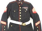 a close up of a military uniform on a white background