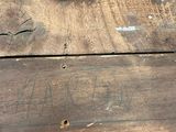 a close up of a piece of wood on a table