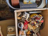 a box full of assorted items sitting on the floor
