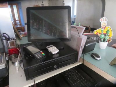 an image of a computer desk with a monitor and a keyboard