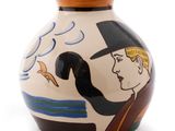 a vase with a picture of a man and a bird on it
