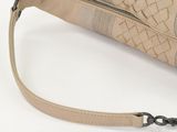 a purse that has a strap on the side of it