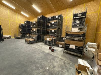 a large room with a lot of boxes on the floor