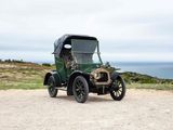 a old car that is parked on the side of the road