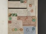 an old book with a bunch of different stamps on it