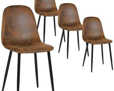 set of four brown leather dining chairs with black metal legs