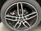 a close up of a tire on a car ' s rim