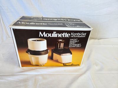 a box that has a blender in it on a table