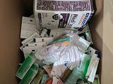 a box full of medicine and other items in it