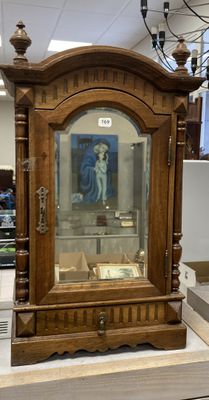 a grandfather clock that is on display in a store