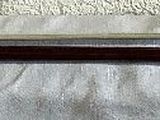 a close up of a curtain with a handle on it