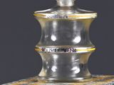 a close up of a bottle of liquor on a table