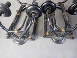 four different types of metal pipes and wheels on a table