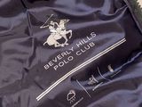 a jacket with a logo on it sitting on a table