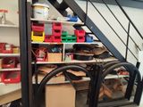 a room with a lot of boxes and boxes on the shelves