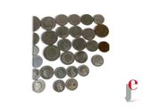 a lot of coins that are on a white surface
