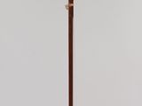 an image of a close up of a wooden object on a pole