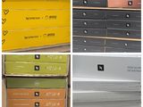 several boxes of different colors and sizes are stacked on top of each other