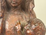 statue of a woman holding a baby in her arms