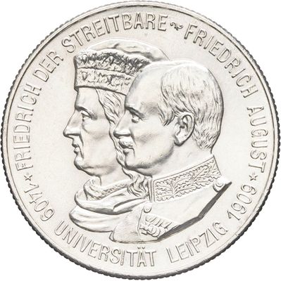 les deux hommes se tiennent côte à côte sur une pièce de monnaie