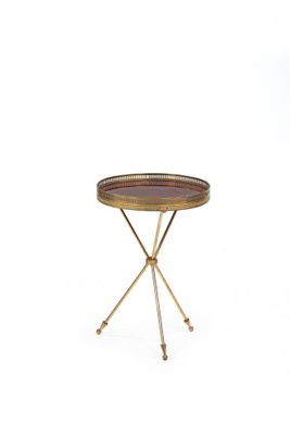 a small table with a metal tray on top of it