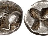 a silver coin with an image of a man and a woman on it