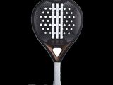 a close up of a tennis racket on a black background