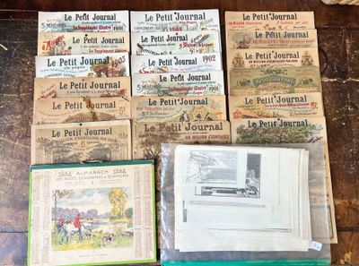 plusieurs livres posés sur une table sur laquelle se trouve une pile de livres
