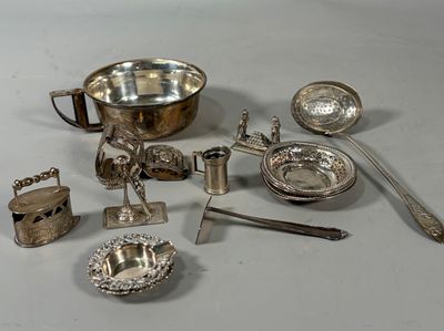 a lot of silver items that are on the table