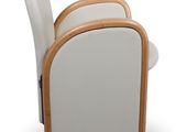 the back of a white chair with a wooden frame on wheels