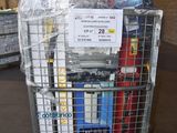 a cart with a lot of items on it in a warehouse