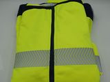 an image of a yellow safety vest on a white surface